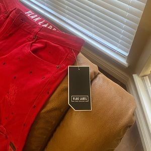 Brand new young men’s jeans never wore